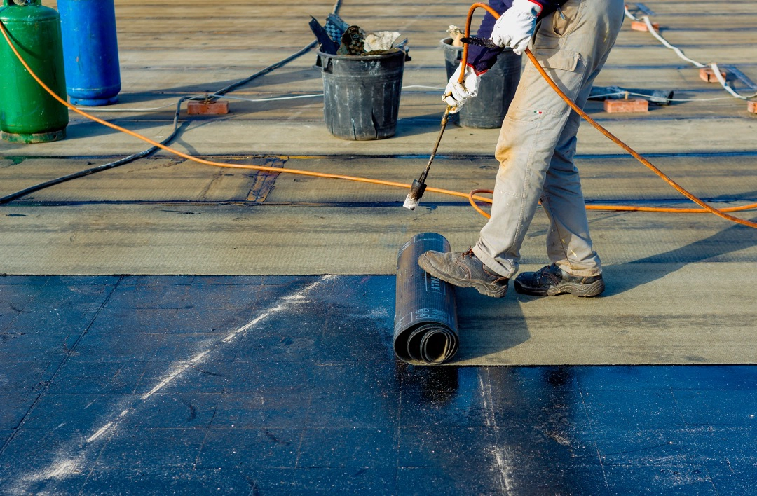 Flat roofing installation at a commercial building in Ukrainian Village, Chicago Flat roofing installation at a commercial building in Ukrainian Village, Chicago